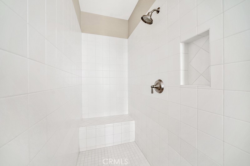 45 Cipresso Irvine, CA 92618 - Photo 22 of 30 a bathroom with a shower