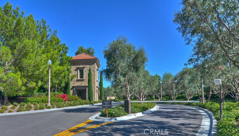 45 Cipresso Irvine, CA 92618 - Photo 24 of 30 a view of a house with a yard and tree s