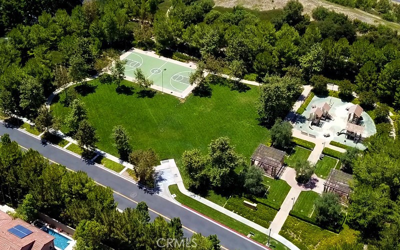 45 Cipresso Irvine, CA 92618 - Photo 30 of 30 an aerial view of a house with a yard and lake view