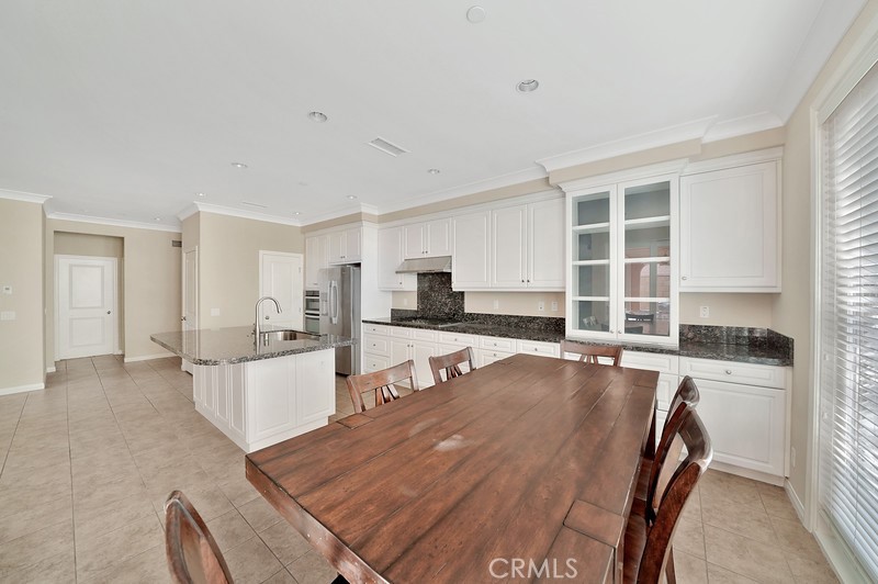 45 Cipresso Irvine, CA 92618 - Photo 5 of 30 a living room with stainless steel appliances furniture a kitchen counter and a sink