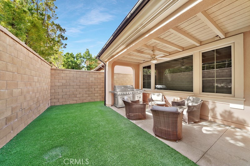 45 Cipresso Irvine, CA 92618 - Photo 8 of 30 a front view of a house with backyard