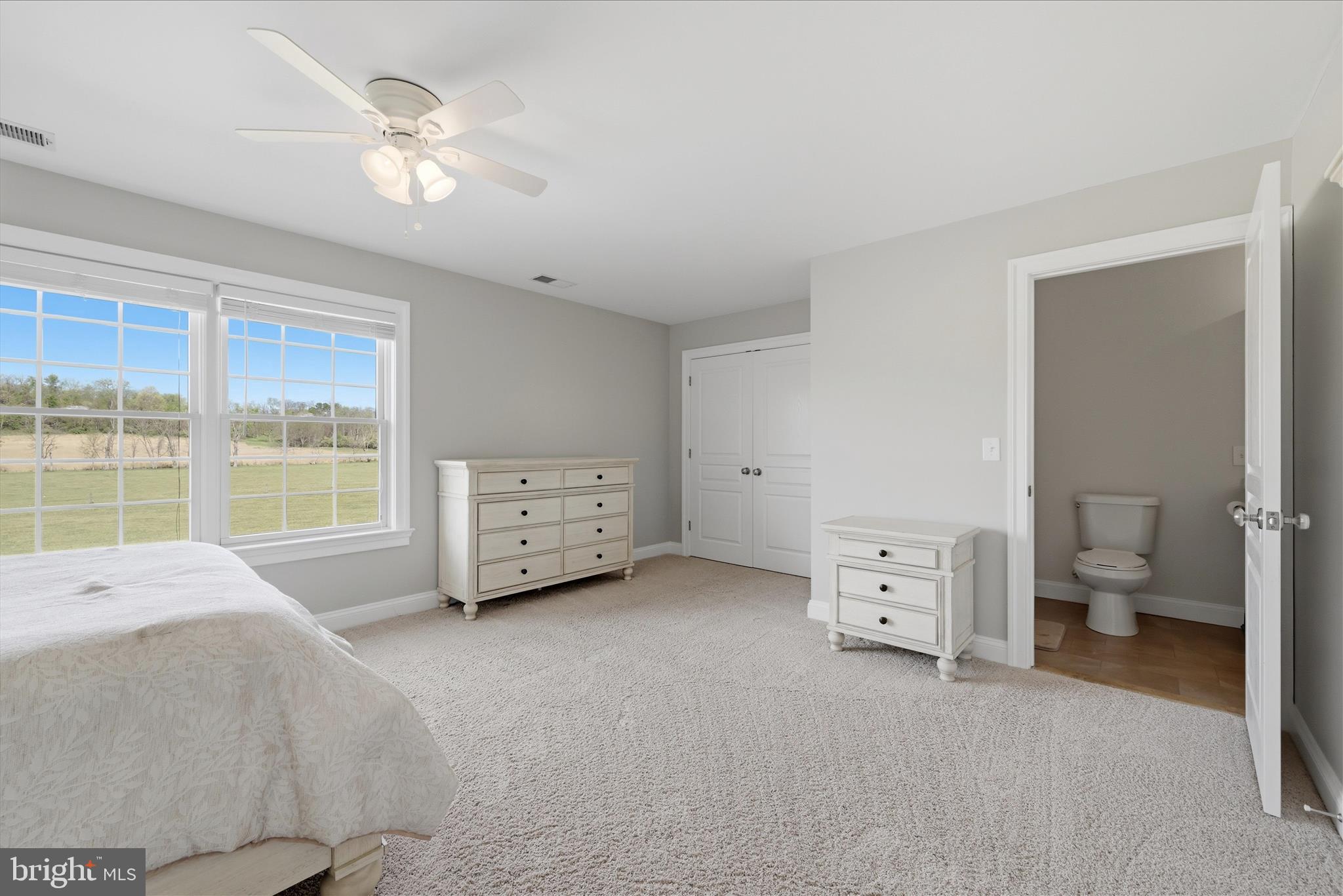 2230 Jones Road Winchester, VA 22602 - Photo 39 of 83 a spacious bedroom with a bed and a large window