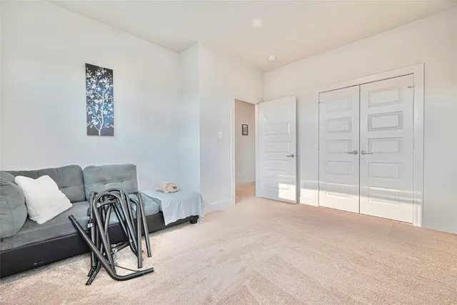 a view of a livingroom with furniture