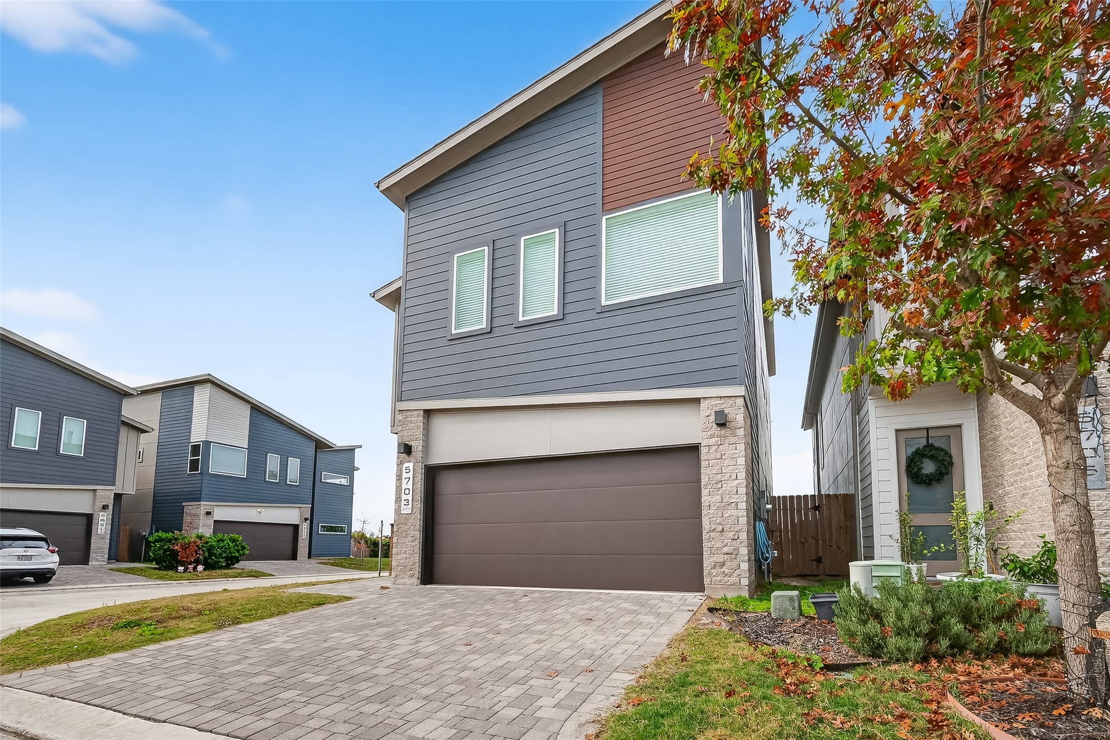 5703 Pampero Lane Houston, TX 77092 - Photo 3 of 41 a front view of a house with a yard and garage