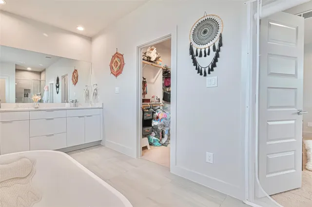 a room with a walk in closet and a window