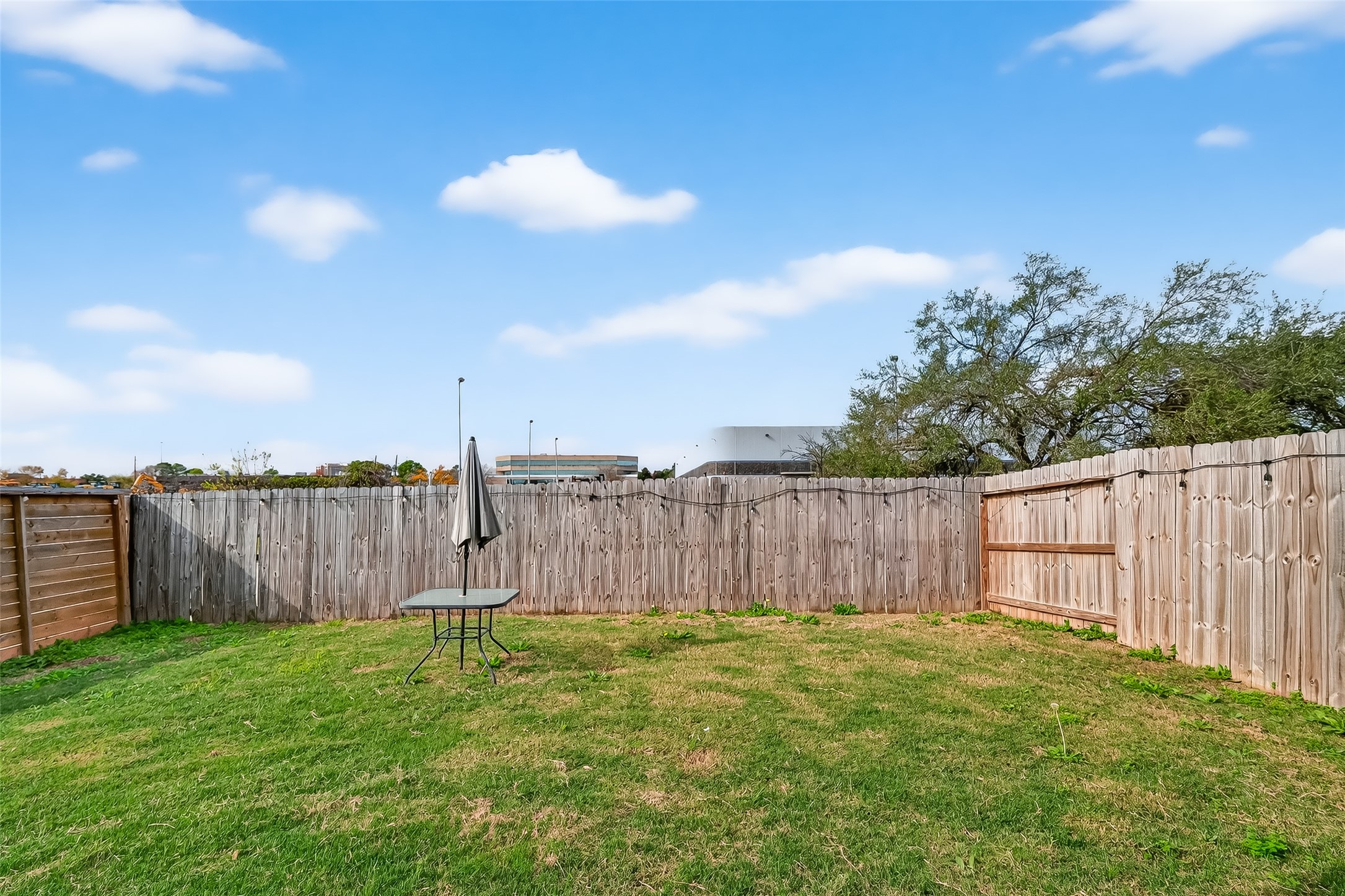 5703 Pampero Lane Houston, TX 77092 - Photo 37 of 41 a view of a backyard with a fence
