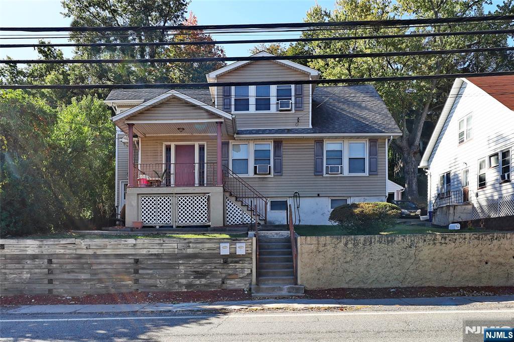 274 Goffle Road Hawthorne, NJ 07506 - Photo 31 of 31 front view of a house with a street