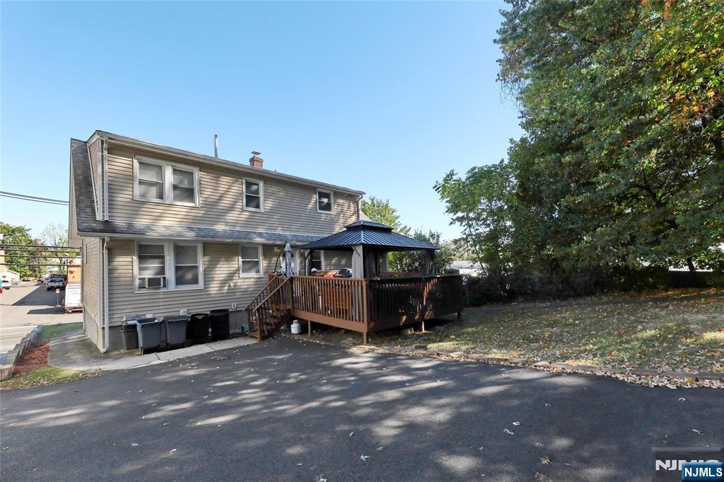 274 Goffle Road Hawthorne, NJ 07506 - Photo 4 of 31 a view of a house with a yard