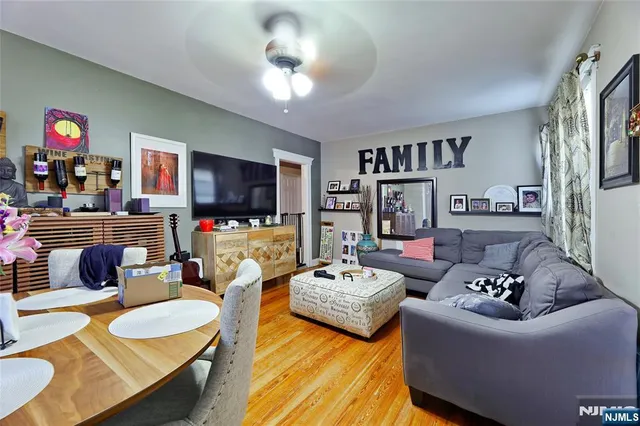 a kitchen with a refrigerator and cabinets