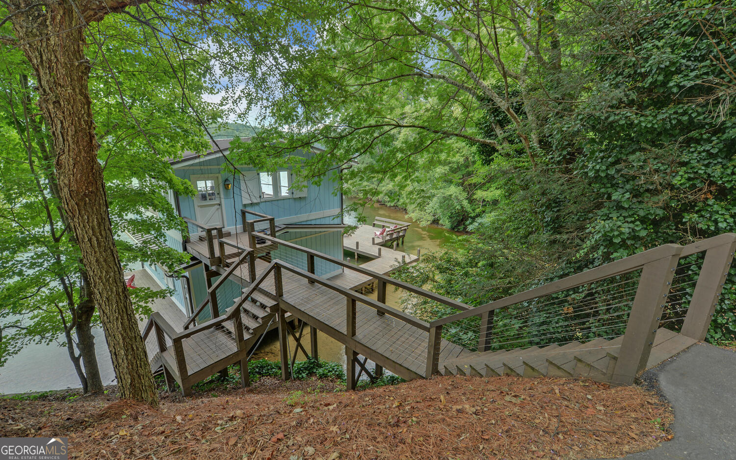 3540 Lake Rabun Road Lakemont, GA 30552 - Photo 66 of 81 a view of a house with large trees