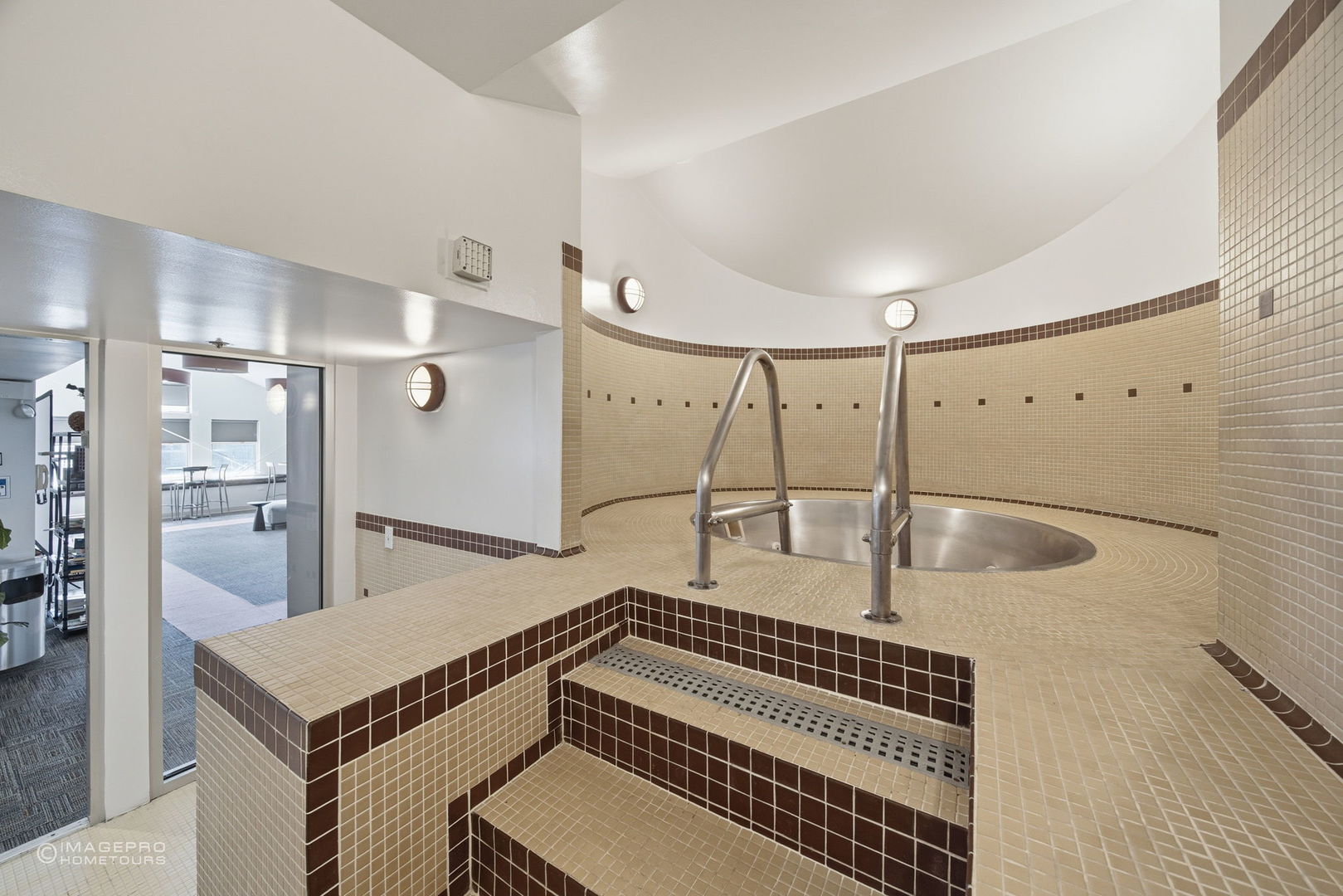 40 East 9th Street, Unit 712 Chicago, IL 60605 - Photo 11 of 26 a bathroom with a sink a toilet and shower