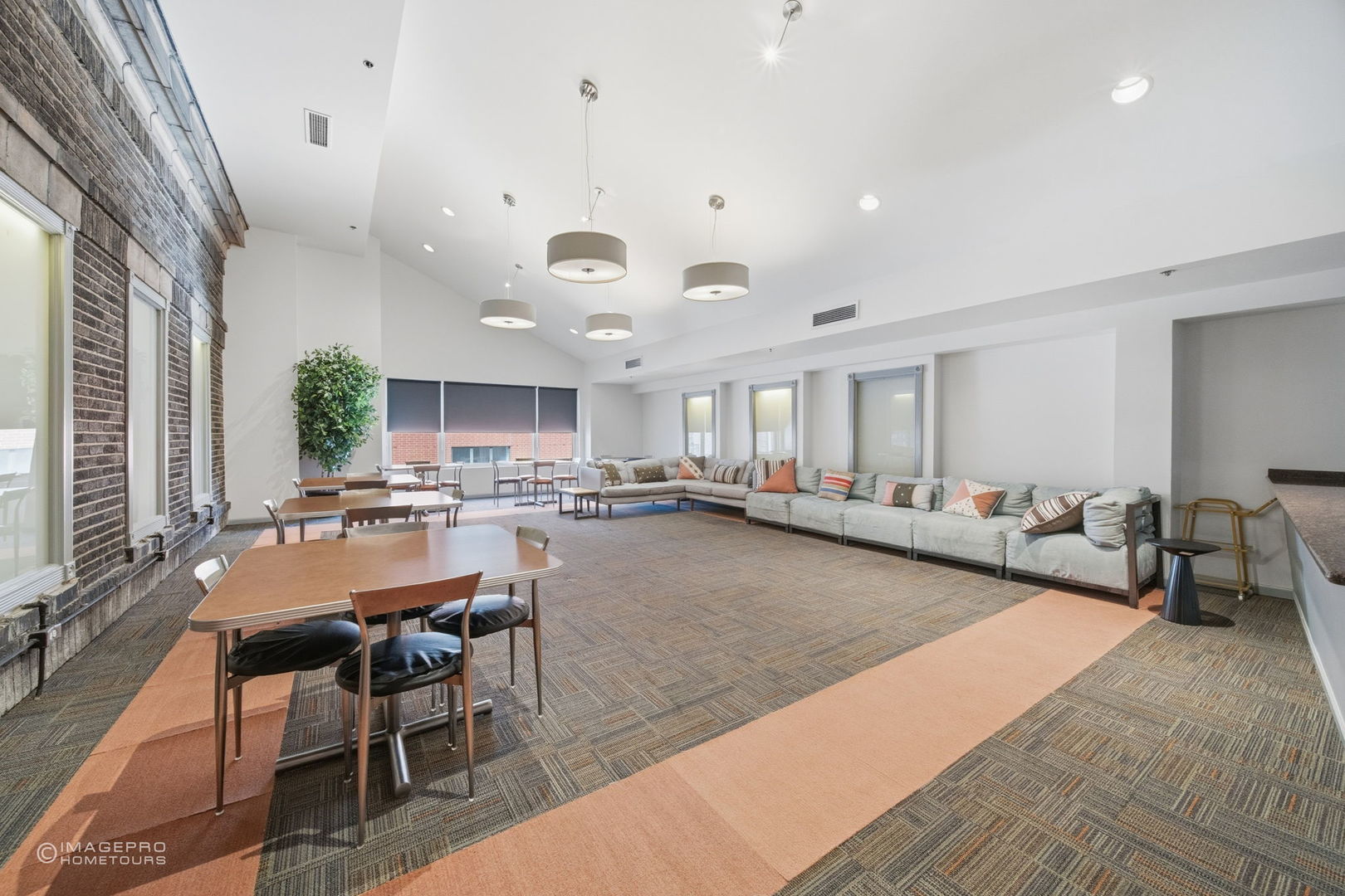 40 East 9th Street, Unit 712 Chicago, IL 60605 - Photo 12 of 26 a dining room with furniture and a large window