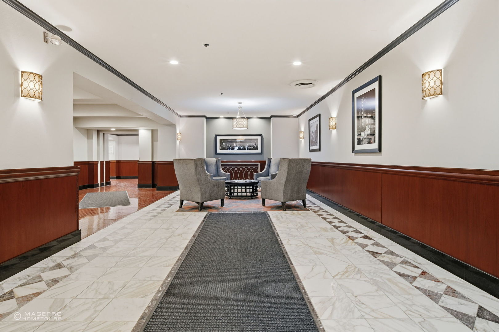 40 East 9th Street, Unit 712 Chicago, IL 60605 - Photo 20 of 26 a living room with furniture and a rug