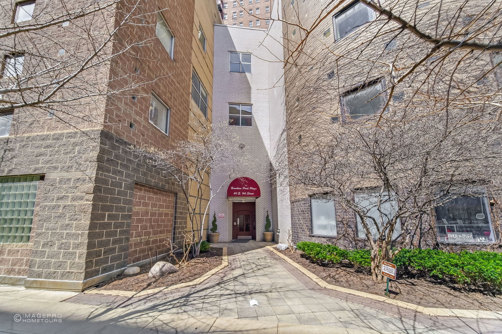 40 East 9th Street, Unit 712 Chicago, IL 60605 - Photo 2 of 26 a view of a building with a street