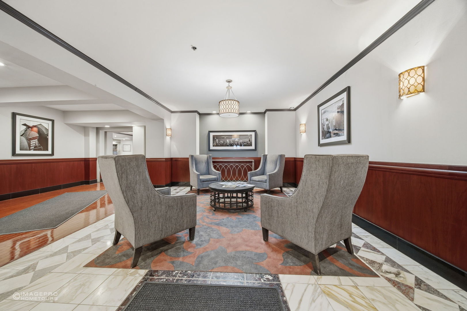 40 East 9th Street, Unit 712 Chicago, IL 60605 - Photo 22 of 26 a living room with furniture and a chandelier