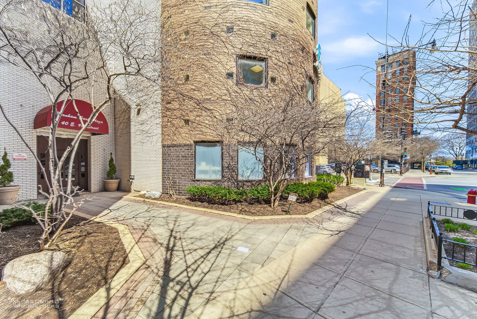 40 East 9th Street, Unit 712 Chicago, IL 60605 - Photo 24 of 26 a front view of a building with pathway