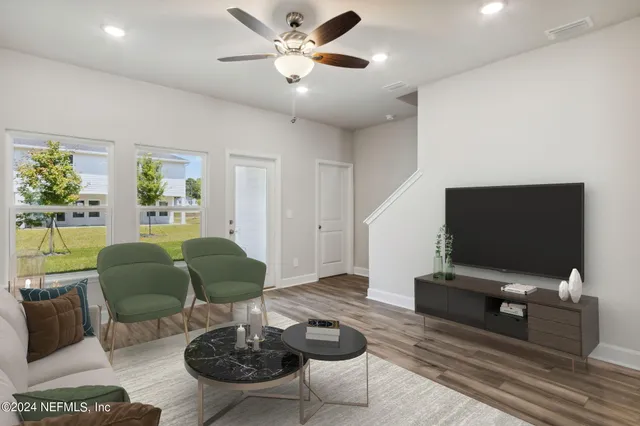 a kitchen with sink cabinets and appliances