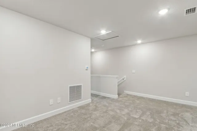 a view of a chairs and table in a patio