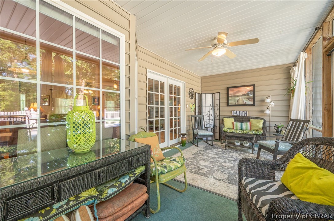 107 Rural Retreat Road Yorktown, VA 23692 - Photo 13 of 41 Amazing screened porch leads to huge trex deck and pool!