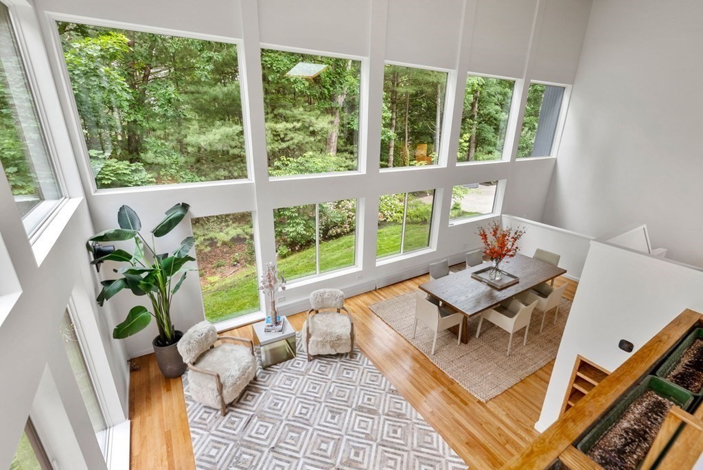 7 Spruce Hill Road Weston, MA 02493 - Photo 13 of 40 a living room with furniture and a large window