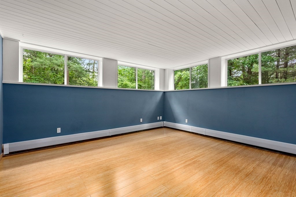 7 Spruce Hill Road Weston, MA 02493 - Photo 30 of 40 an empty room with a window
