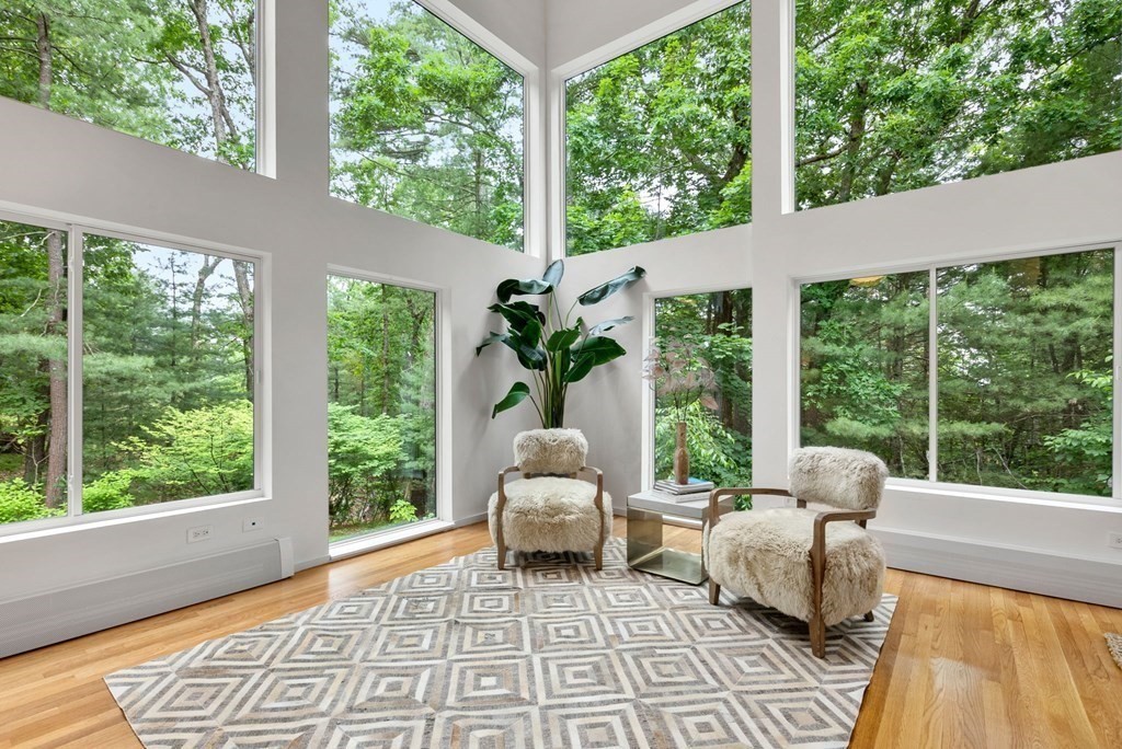 7 Spruce Hill Road Weston, MA 02493 - Photo 5 of 40 a living room with large windows and furniture