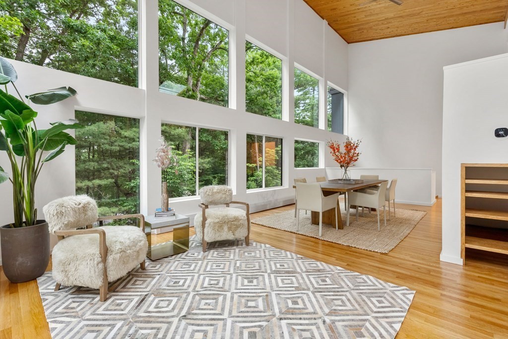 7 Spruce Hill Road Weston, MA 02493 - Photo 6 of 40 a living room with furniture and floor to ceiling windows