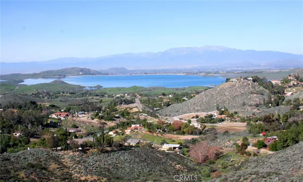 an aerial view of residential house and mountain view