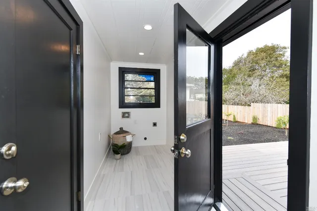 a view of a living room and a window