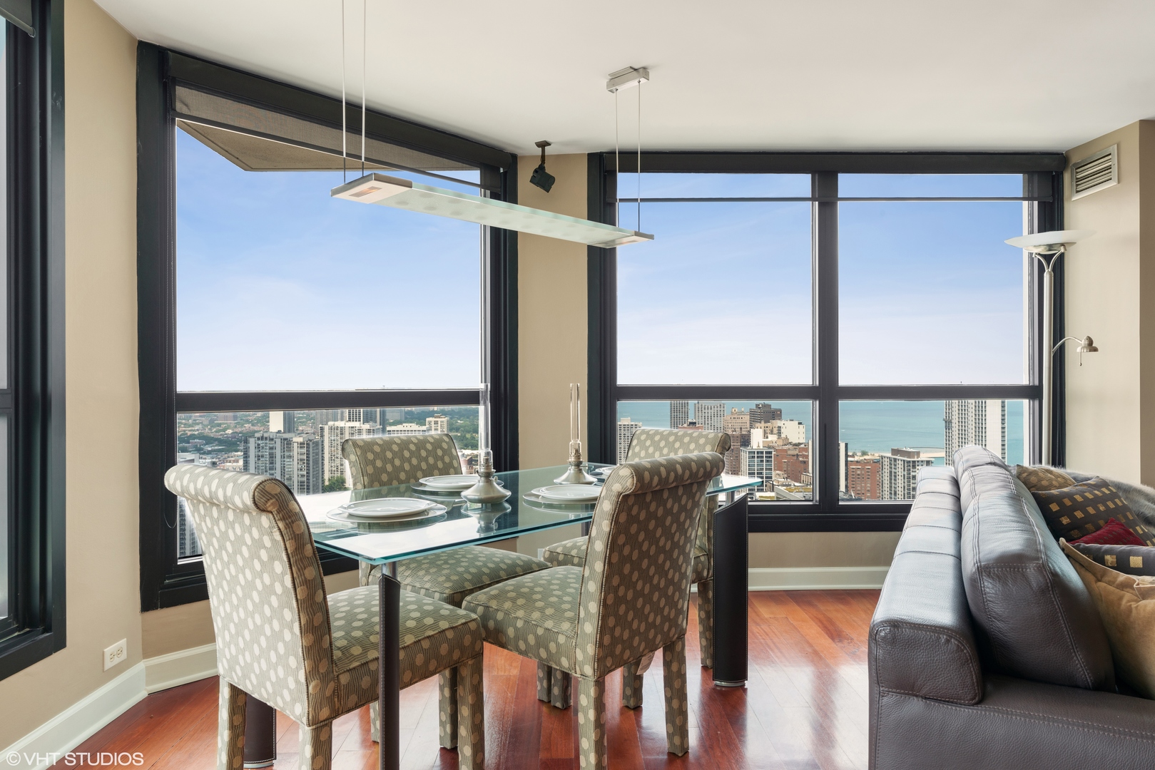 1030 North State Street, Unit 39B Chicago, IL 60610 - Photo 12 of 23 a dining room with furniture and a window