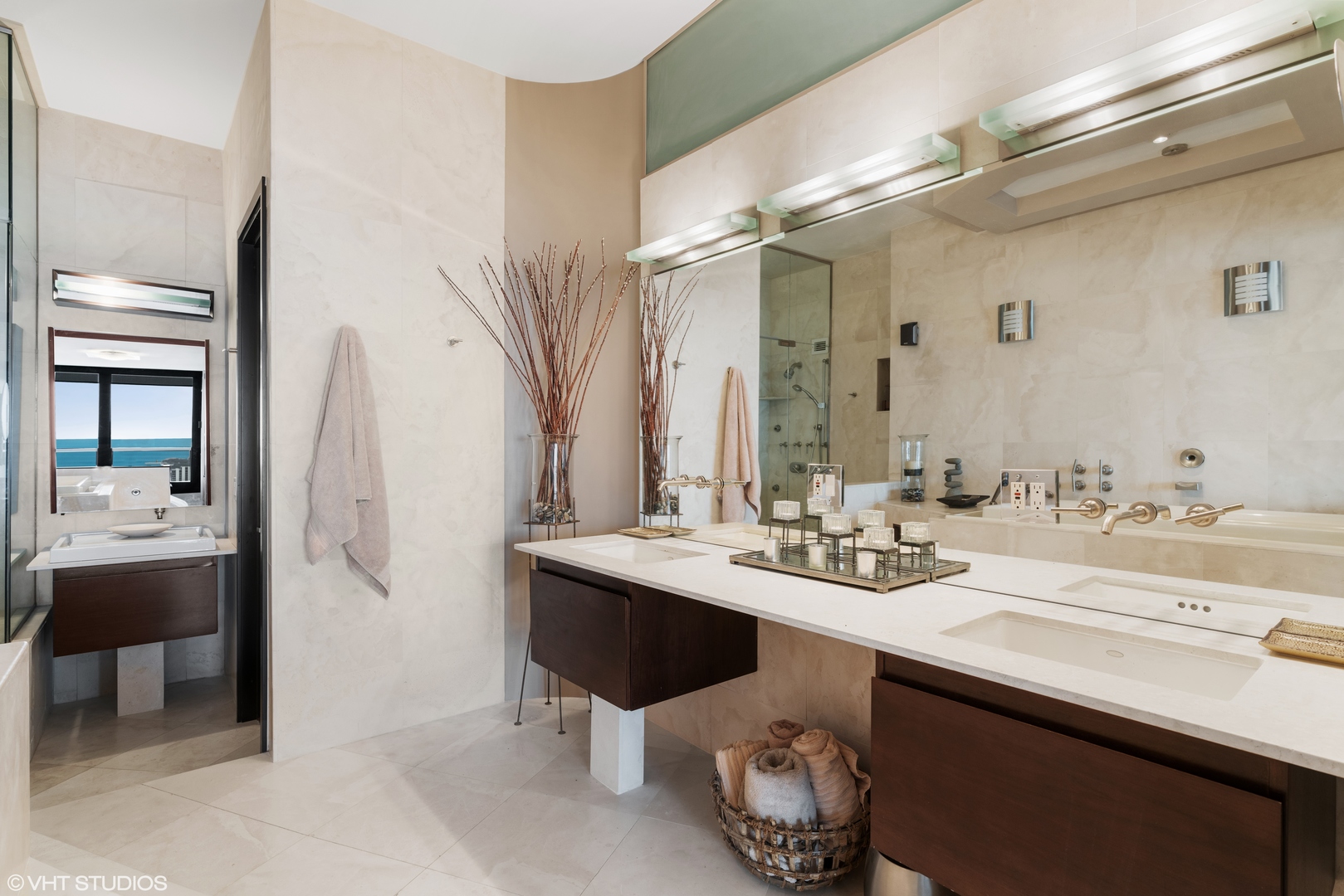1030 North State Street, Unit 39B Chicago, IL 60610 - Photo 16 of 23 a bathroom with a sink double vanity granite and a mirror