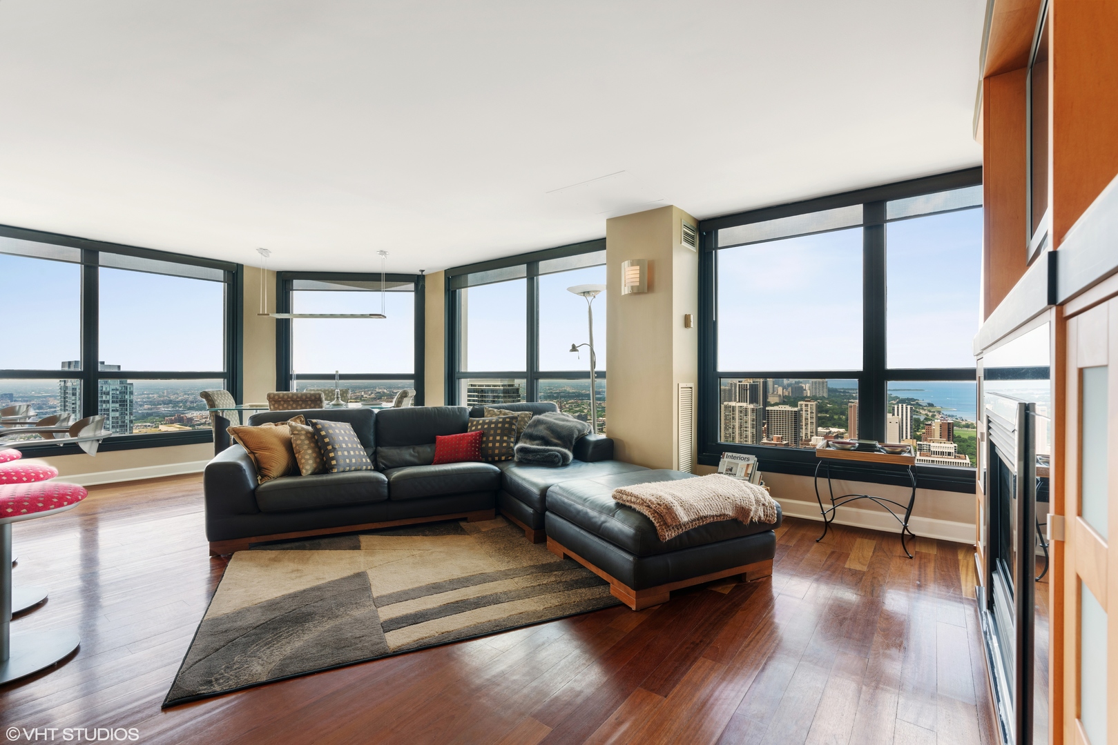 1030 North State Street, Unit 39B Chicago, IL 60610 - Photo 4 of 23 a living room with furniture and a large window