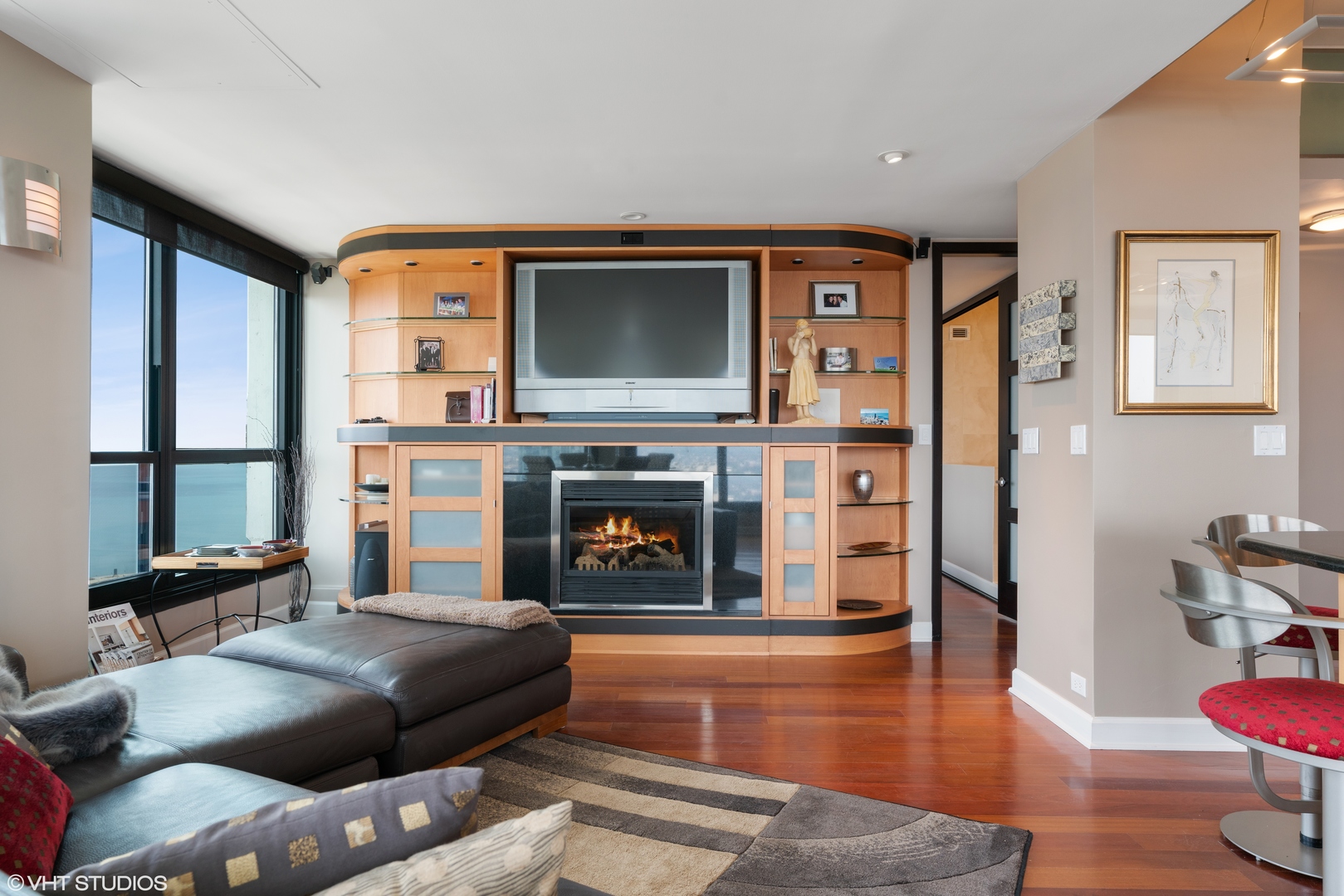 1030 North State Street, Unit 39B Chicago, IL 60610 - Photo 6 of 23 a living room with furniture and a fireplace