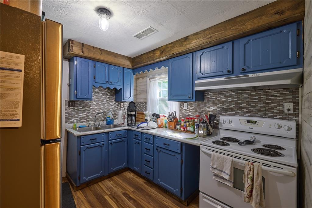 106-108 Davis Road Sewickley, PA 15143 - Photo 6 of 28 108 Davis - partially updated kitchen