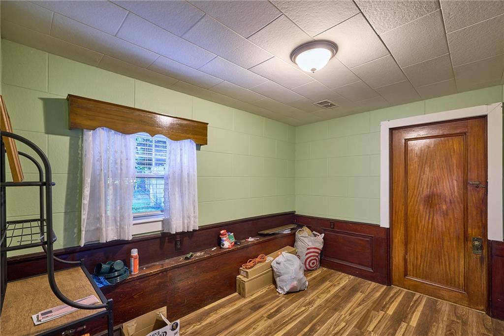 106-108 Davis Road Sewickley, PA 15143 - Photo 7 of 28 108 Davis - dining room with door to shared laundry/ storage area