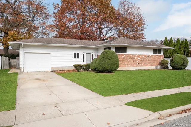 a front view of house with yard