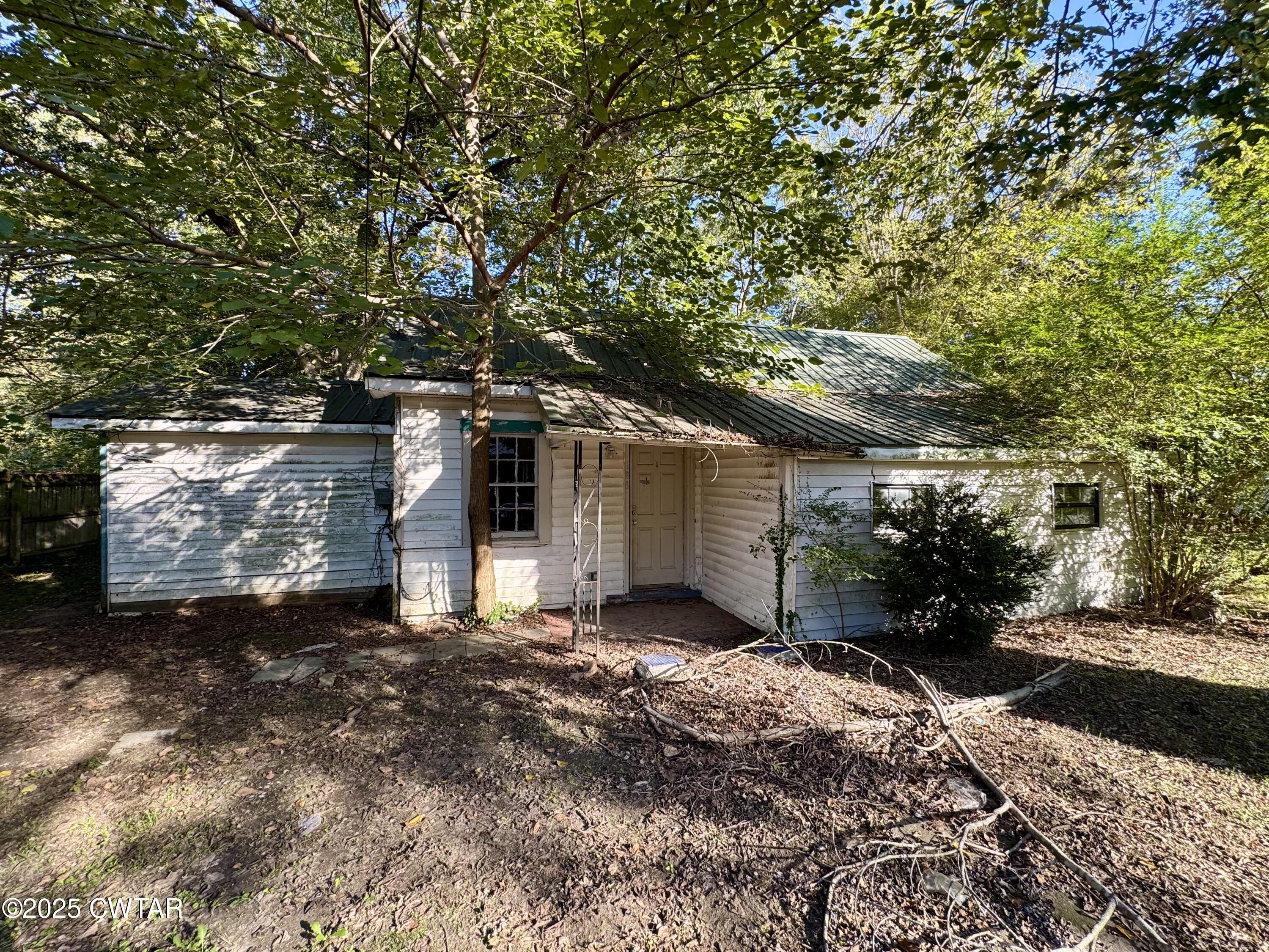 188 Mill Street Trimble, TN 38259 - Photo 1 of 17 a view of a house with a yard