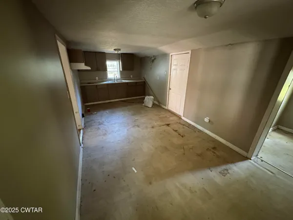 a view of room and front door