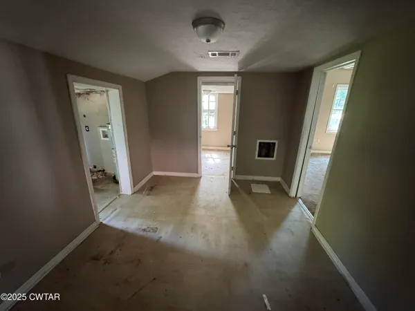 a view of livingroom with hardwood floor and hallway