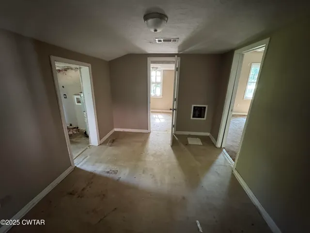 a view of livingroom with hardwood floor and hallway