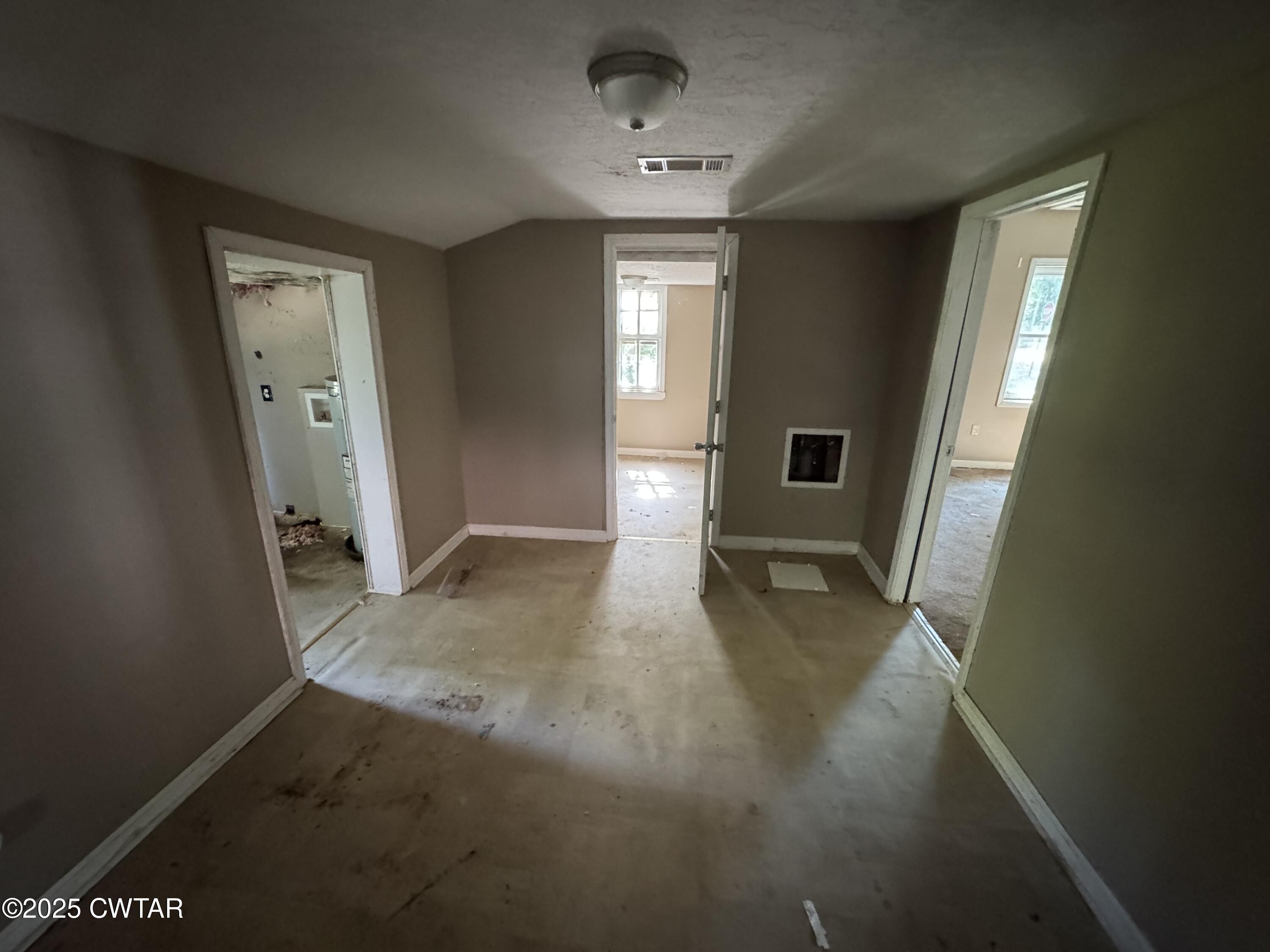 188 Mill Street Trimble, TN 38259 - Photo 13 of 17 a view of livingroom with hardwood floor and hallway