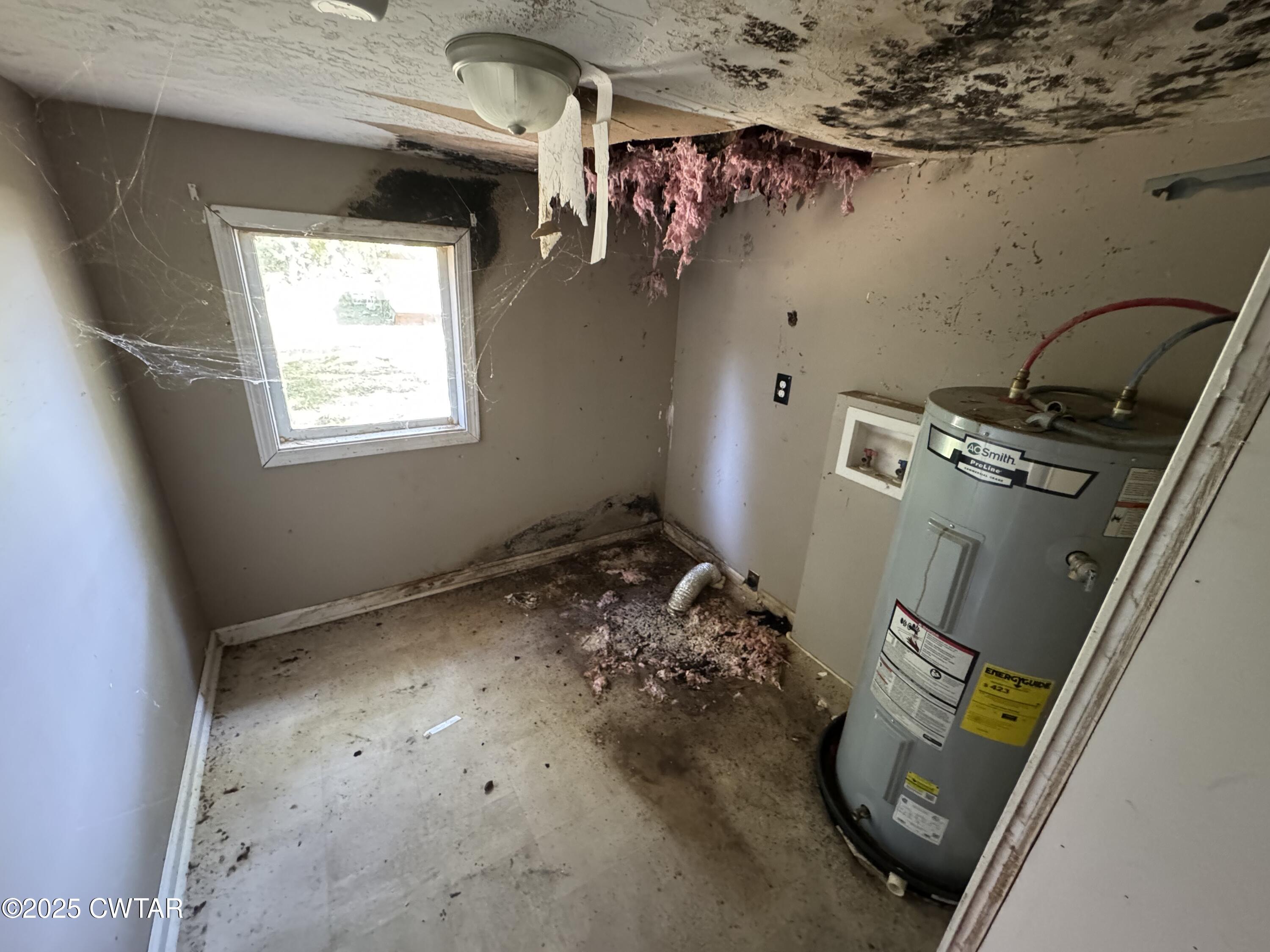 188 Mill Street Trimble, TN 38259 - Photo 17 of 17 an empty room with windows