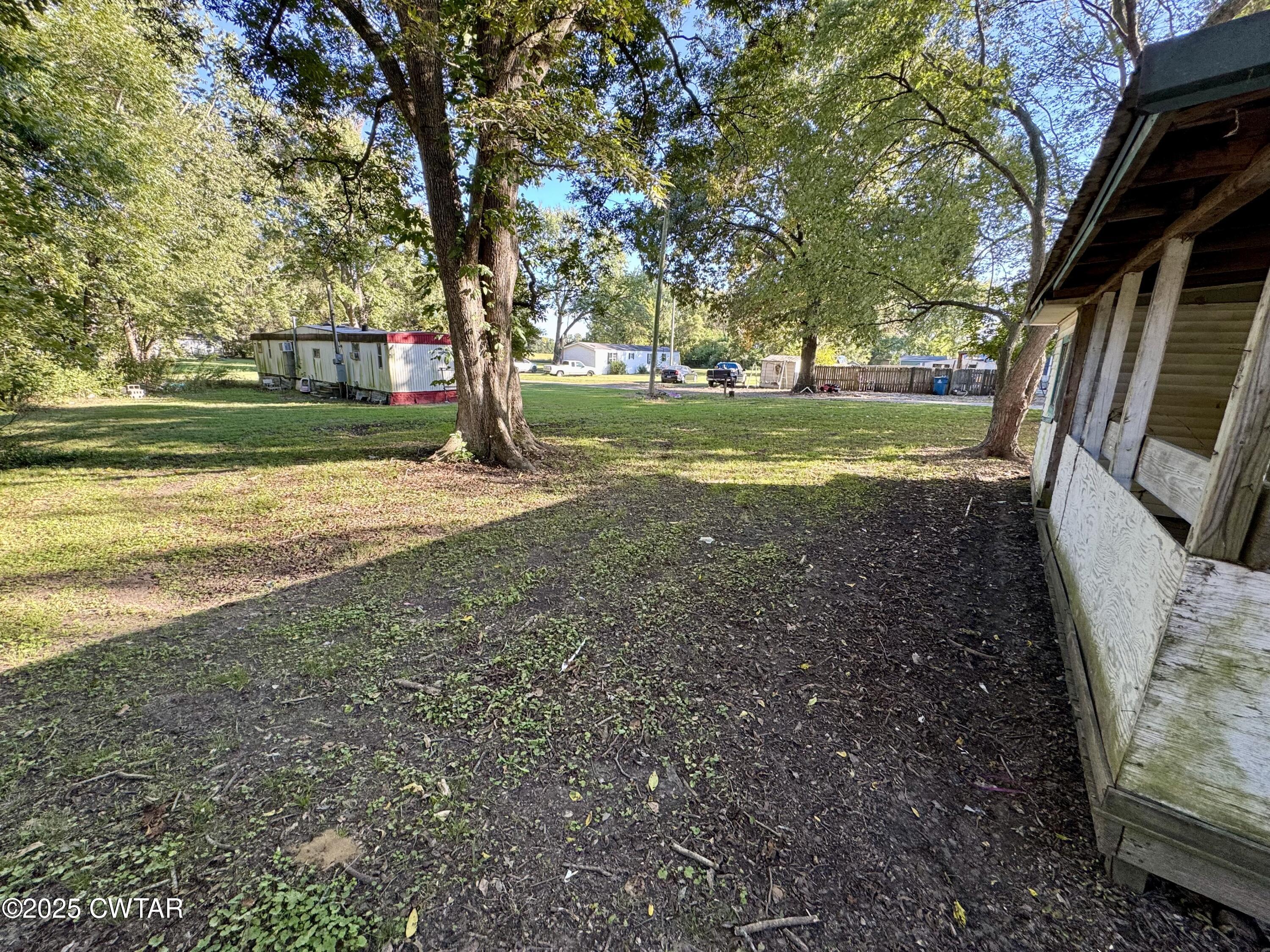 188 Mill Street Trimble, TN 38259 - Photo 4 of 17 a view of outdoor space with garden