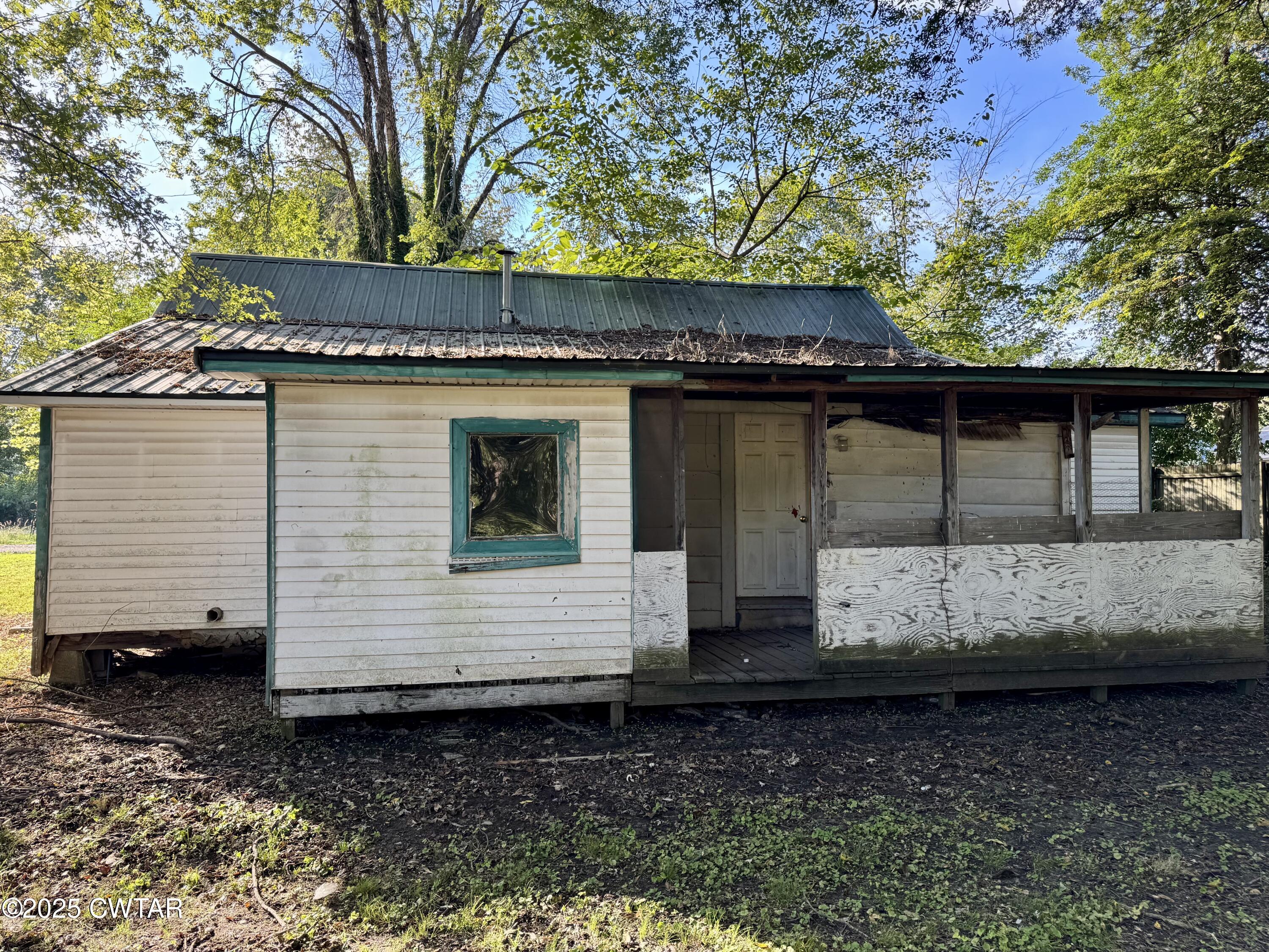 188 Mill Street Trimble, TN 38259 - Photo 5 of 17 a view of a house with a yard