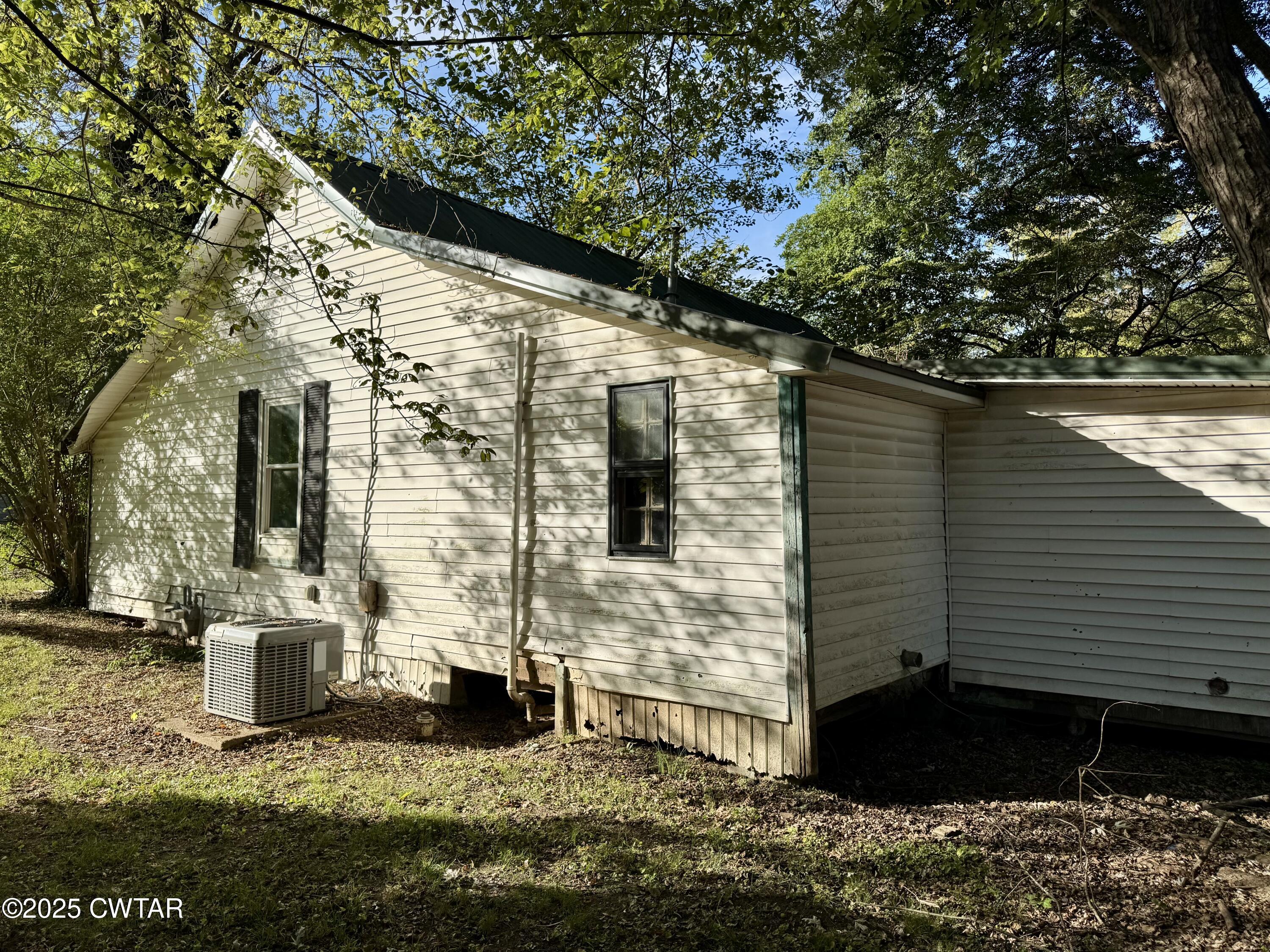 188 Mill Street Trimble, TN 38259 - Photo 6 of 17 a view of house with backyard