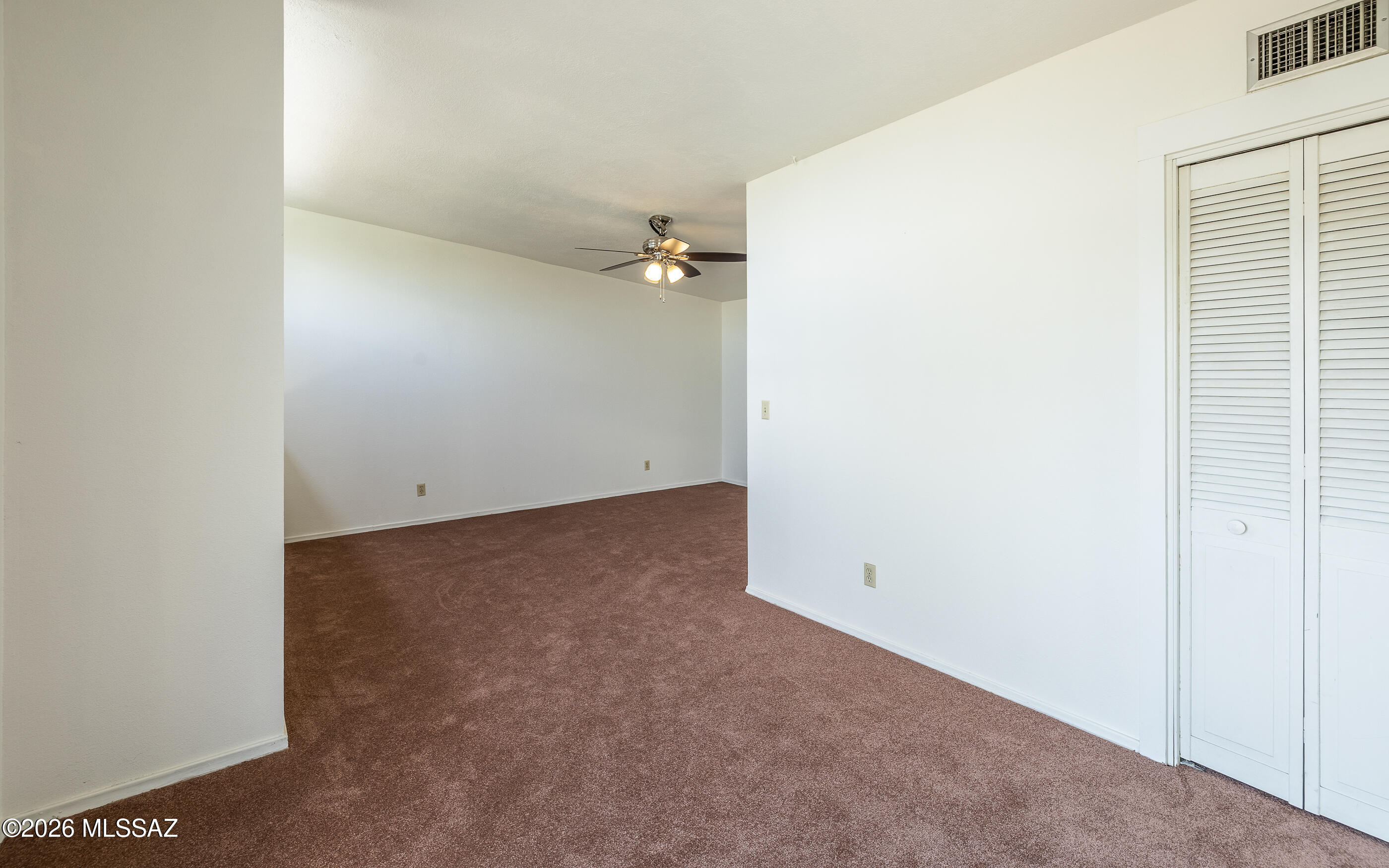 3750 North Country Club Road, Unit 46 Tucson, AZ 85716 - Photo 25 of 34 an empty room with a potted plant