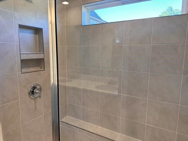 1000 Heartstone Way Durham, NC 27713 - Photo 12 of 35 a bathroom with a shower