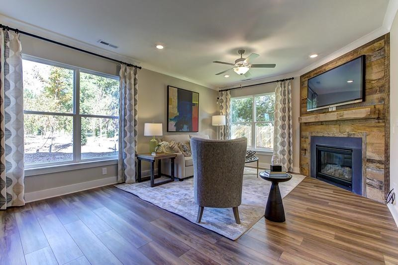 1000 Heartstone Way Durham, NC 27713 - Photo 20 of 35 a living room with furniture fireplace and flat screen tv