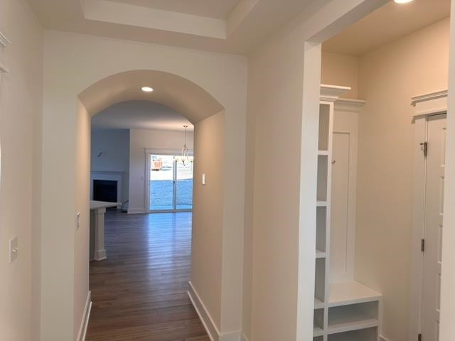 1000 Heartstone Way Durham, NC 27713 - Photo 2 of 35 a view of a hallway with wooden floor and a bathroom