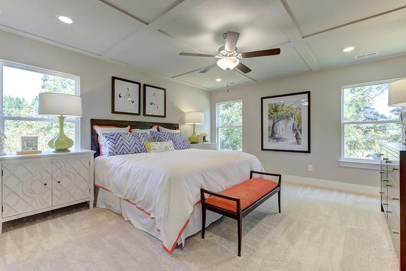 1000 Heartstone Way Durham, NC 27713 - Photo 23 of 35 a bedroom with a large bed and a window